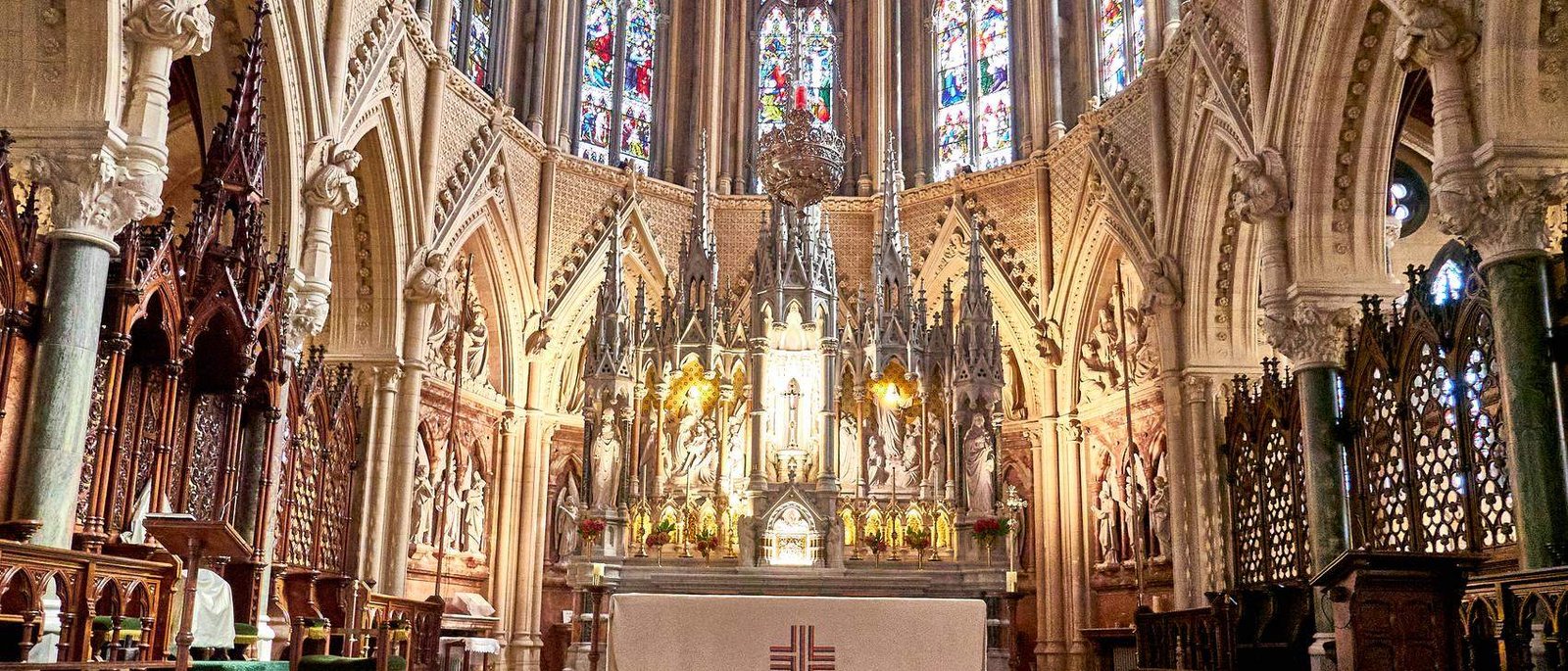 A high altar lit for prayer